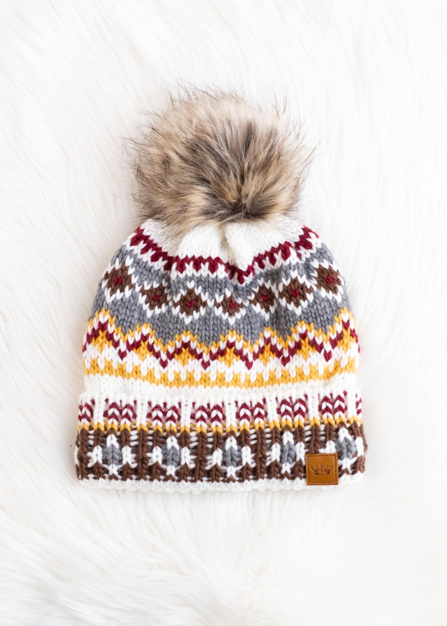 Multicolored Patterned Pom Hat