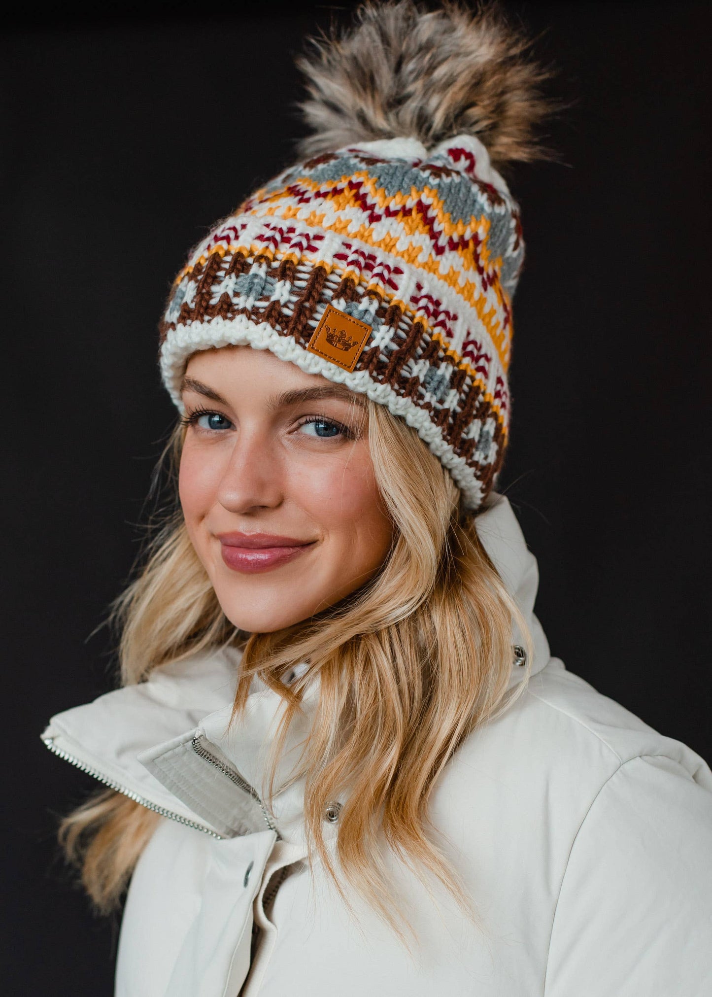 Multicolored Patterned Pom Hat