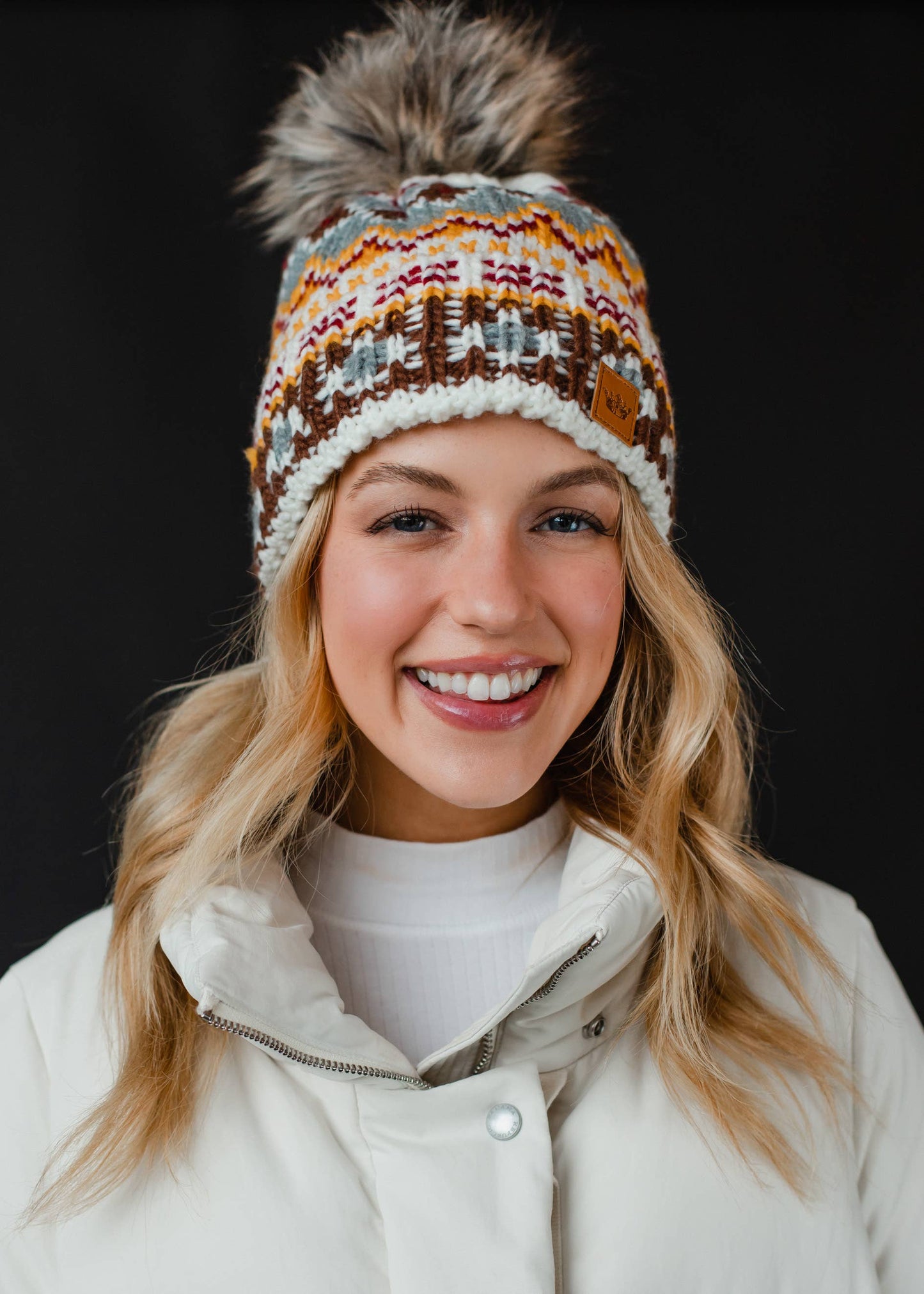 Multicolored Patterned Pom Hat
