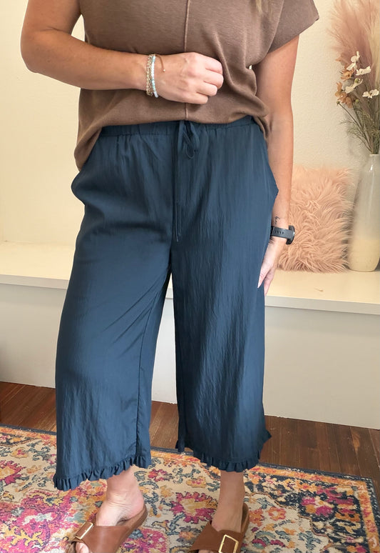 Navy Ruffle Capri Pant